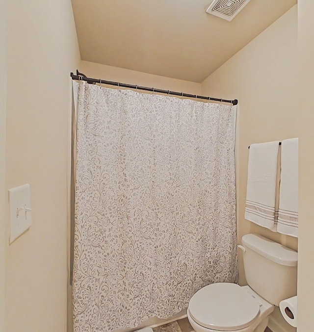 1038 Dietrich Ln, North Augusta, SC 29860 - bathroom featuring toilet and curtained shower