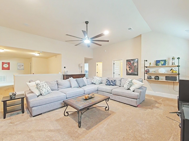 1038 Dietrich Ln, North Augusta, SC 29860 - carpeted living area featuring a ceiling fan, lofted ceiling, and baseboards