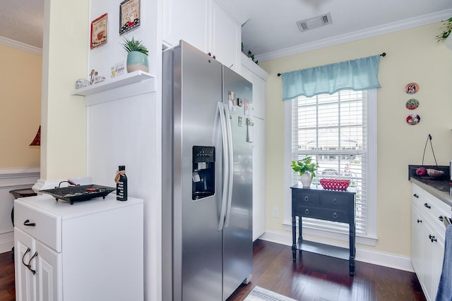 kitchen featuring stainless steel fridge with ice dispenser, ornamental molding, dark wood finished floors, and white cabinetry