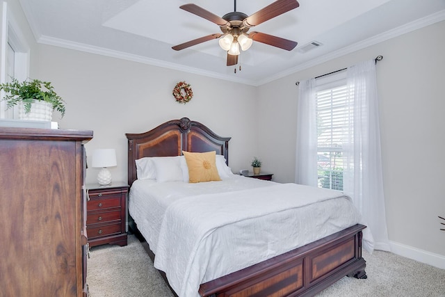 bedroom with light carpet, baseboards, ornamental molding, and ceiling fan