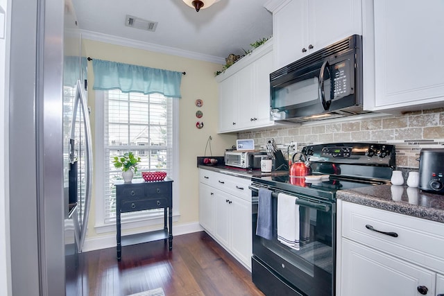 kitchen featuring black appliances, backsplash, ornamental molding, white cabinetry, and dark countertops