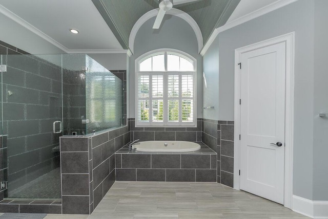 bathroom with ceiling fan, plus walk in shower, and ornamental molding