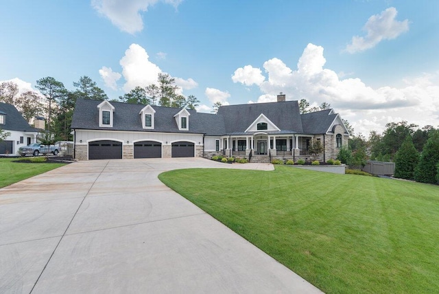 cape cod home with a garage and a front yard