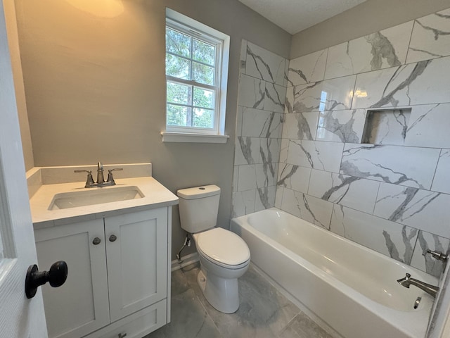 full bathroom featuring vanity, toilet, and tiled shower / bath combo