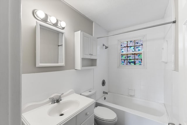 full bathroom featuring toilet, bathtub / shower combination, and vanity