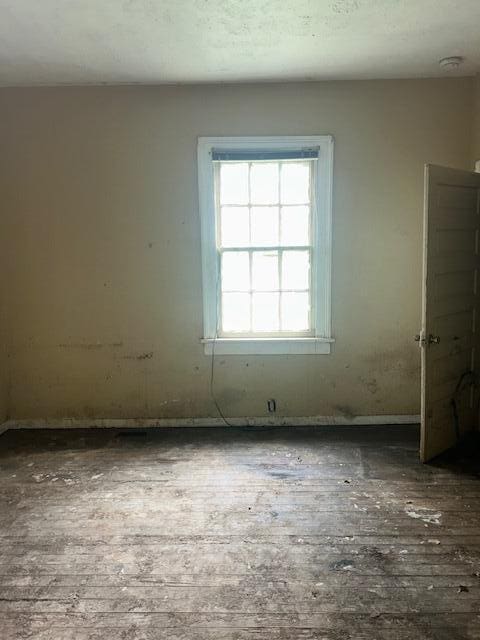1620 12th St, Augusta, GA 30901 - spare room with a smoke detector