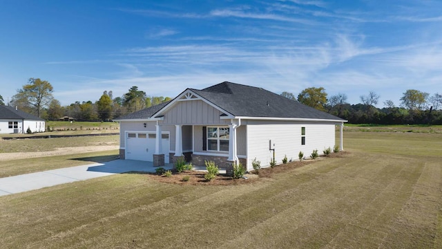 view of front of property featuring board and batten siding, a front lawn, roof with shingles, driveway, and an attached garage