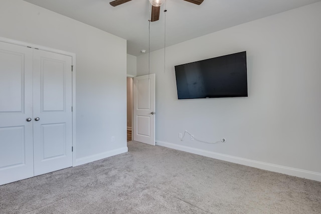 1056 Candleberry Dr, Grovetown, GA 30813 - unfurnished bedroom featuring carpet, a closet, and a ceiling fan