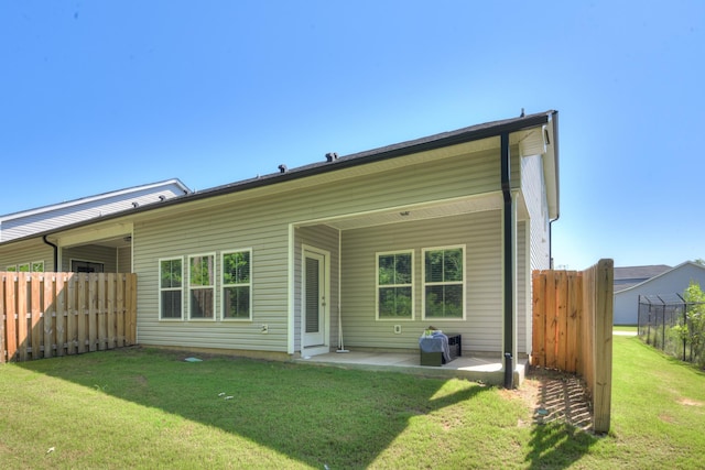 1056 Candleberry Dr, Grovetown, GA 30813 - back of house featuring a patio area