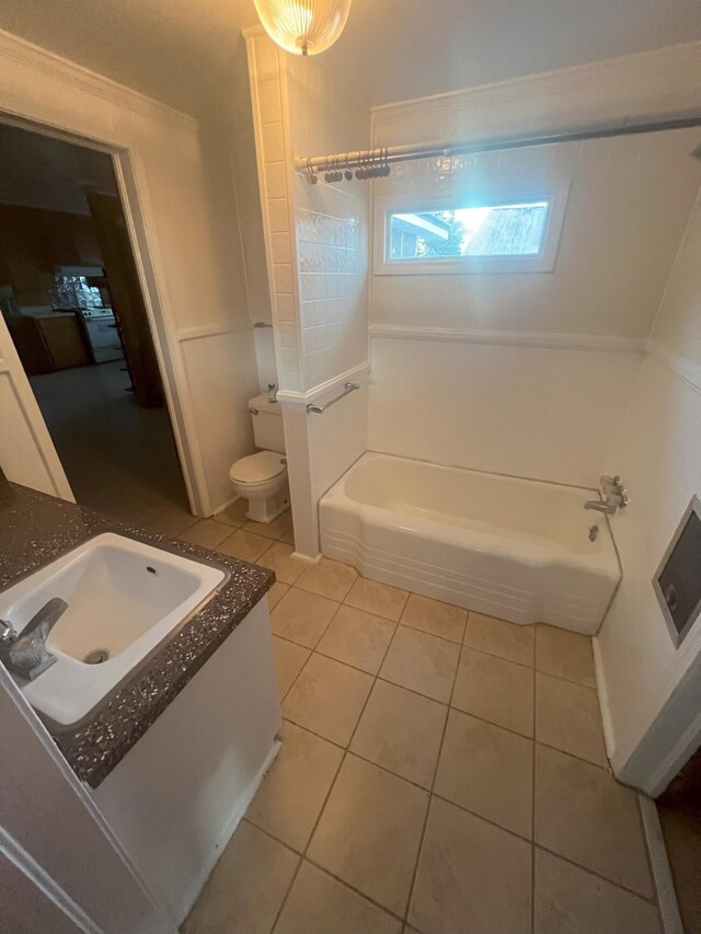 full bathroom featuring tile patterned floors, vanity, toilet, and shower / washtub combination