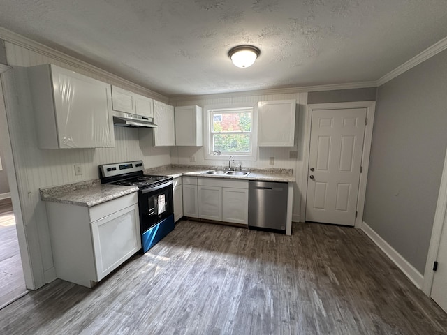 kitchen with white cabinetry, sink, dark hardwood / wood-style floors, a textured ceiling, and appliances with stainless steel finishes