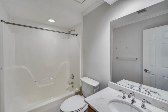 full bathroom with vanity, toilet, crown molding, and shower / washtub combination