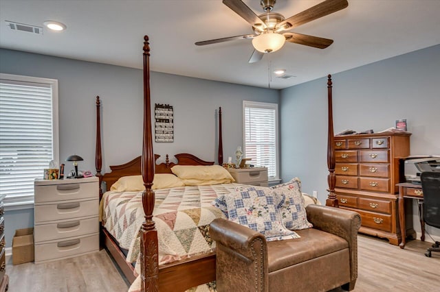 bedroom featuring light hardwood / wood-style flooring and ceiling fan