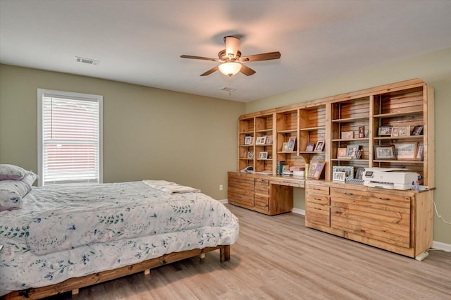 bedroom featuring ceiling fan and light wood-type flooring