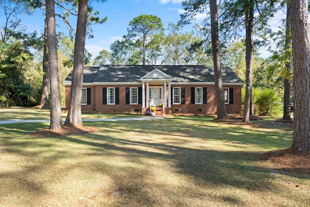 single story home featuring a front yard