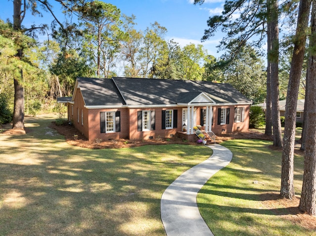 ranch-style house with a front yard