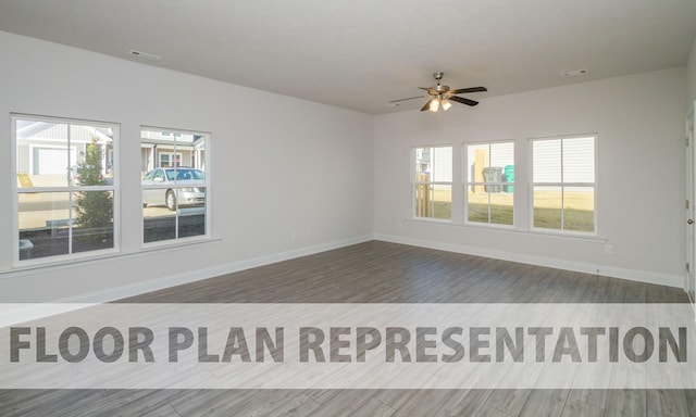 spare room with a ceiling fan, baseboards, visible vents, and wood finished floors