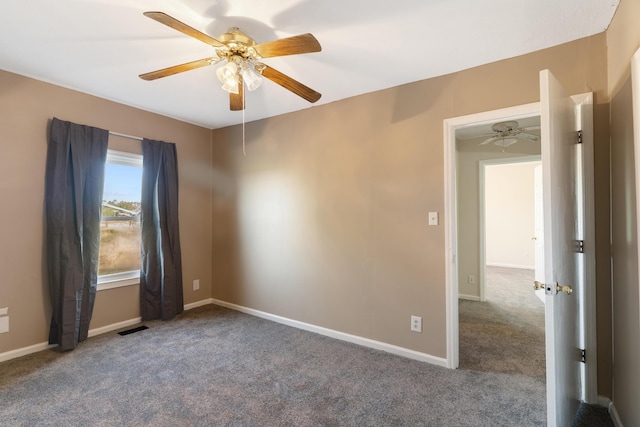 5950 E Ga Highway 24, Louisville, GA 30434 - carpeted empty room featuring a ceiling fan and baseboards