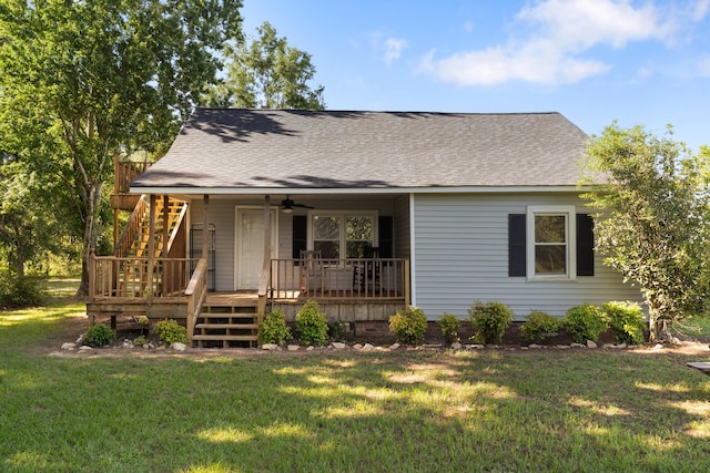 5950 E Ga Highway 24, Louisville, GA 30434 - view of front of house featuring stairs, a ceiling fan, and a front yard