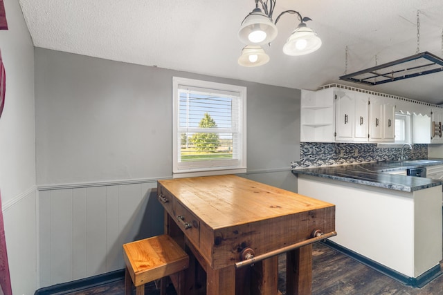 5950 E Ga Highway 24, Louisville, GA 30434 - kitchen with open shelves, a sink, white cabinets, dark wood-style floors, and dark countertops