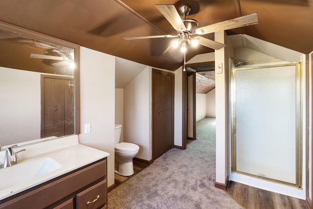 5950 E Ga Highway 24, Louisville, GA 30434 - full bathroom featuring vanity, a stall shower, toilet, vaulted ceiling, and ceiling fan