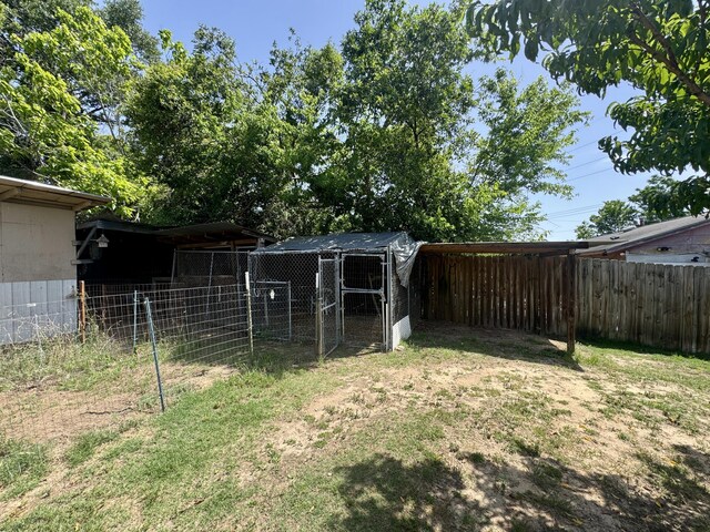 2255 Walden Dr, Augusta, GA 30904 - view of yard with fence and an outdoor structure