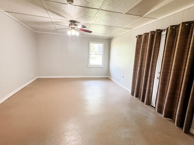 2255 Walden Dr, Augusta, GA 30904 - empty room with a ceiling fan, finished concrete floors, and wood walls
