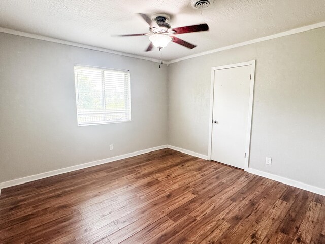 2255 Walden Dr, Augusta, GA 30904 - empty room with ornamental molding, wood finished floors, ceiling fan, baseboards, and a textured ceiling