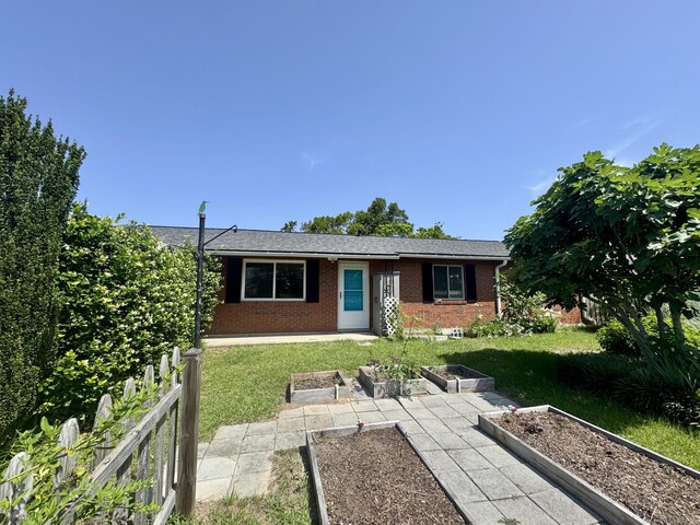 2255 Walden Dr, Augusta, GA 30904 - single story home with a garden and brick siding