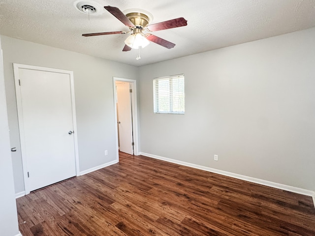 2255 Walden Dr, Augusta, GA 30904 - unfurnished bedroom featuring wood finished floors, baseboards, and ceiling fan