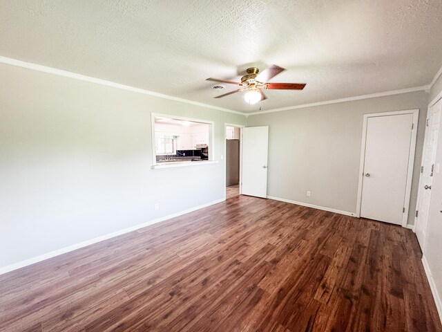 2255 Walden Dr, Augusta, GA 30904 - spare room with a ceiling fan, wood finished floors, a textured ceiling, baseboards, and ornamental molding