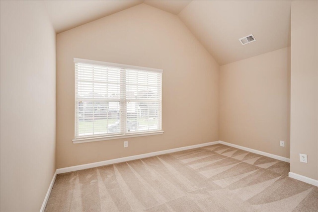 2083 Willhaven Dr, Augusta, GA 30909 - spare room with light carpet, lofted ceiling, and baseboards