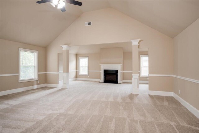 2083 Willhaven Dr, Augusta, GA 30909 - unfurnished living room featuring a ceiling fan, high vaulted ceiling, light colored carpet, a fireplace with flush hearth, and baseboards