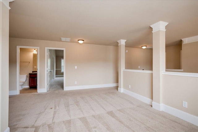 2083 Willhaven Dr, Augusta, GA 30909 - empty room with light carpet, baseboards, and ornate columns