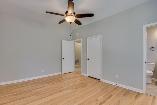 807 Crawford Ave, Augusta, GA 30904 - unfurnished bedroom featuring light wood-style flooring, connected bathroom, baseboards, and a ceiling fan