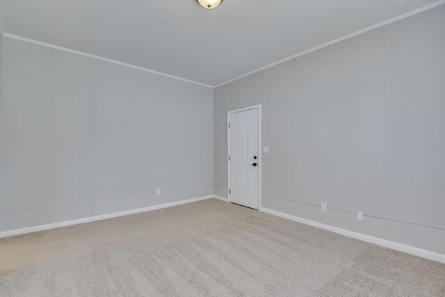 807 Crawford Ave, Augusta, GA 30904 - spare room featuring crown molding, carpet floors, and baseboards