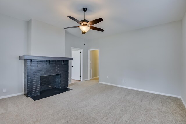 807 Crawford Ave, Augusta, GA 30904 - unfurnished living room with a ceiling fan, carpet floors, baseboards, and a fireplace
