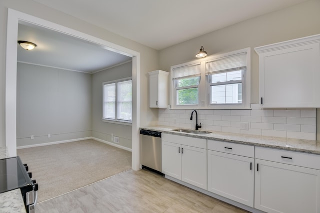 807 Crawford Ave, Augusta, GA 30904 - kitchen with dishwasher, a sink, electric stove, white cabinets, and backsplash