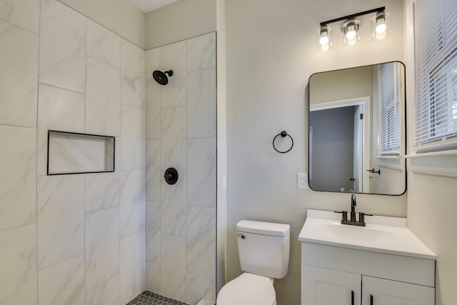 807 Crawford Ave, Augusta, GA 30904 - full bathroom with vanity, a tile shower, and toilet
