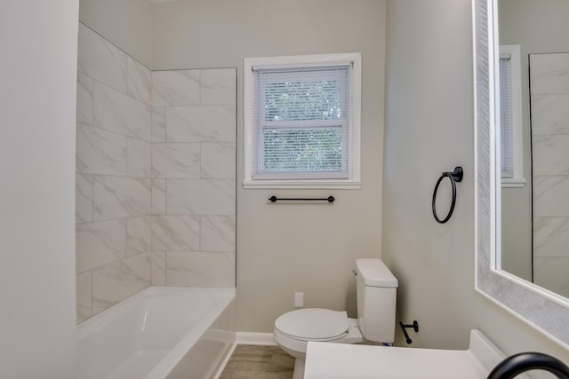 807 Crawford Ave, Augusta, GA 30904 - full bathroom with toilet, vanity, tub / shower combination, and baseboards