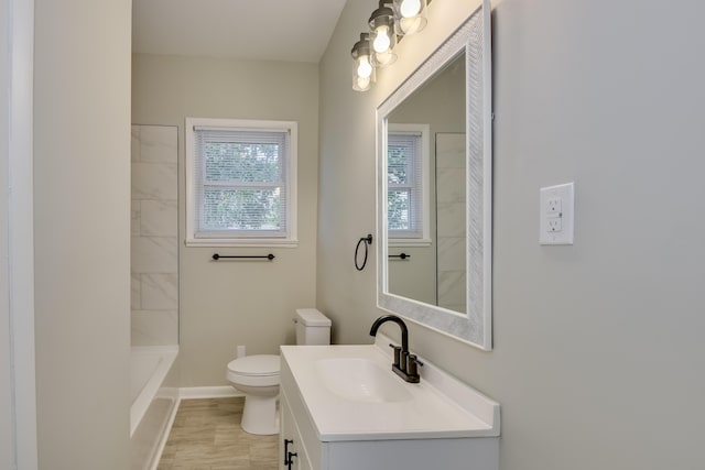 807 Crawford Ave, Augusta, GA 30904 - bathroom with vanity, toilet, baseboards, and  shower combination