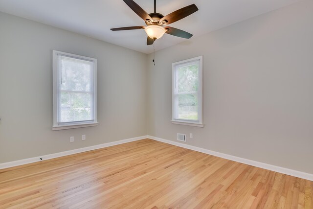 807 Crawford Ave, Augusta, GA 30904 - empty room featuring wood finished floors, a ceiling fan, and baseboards