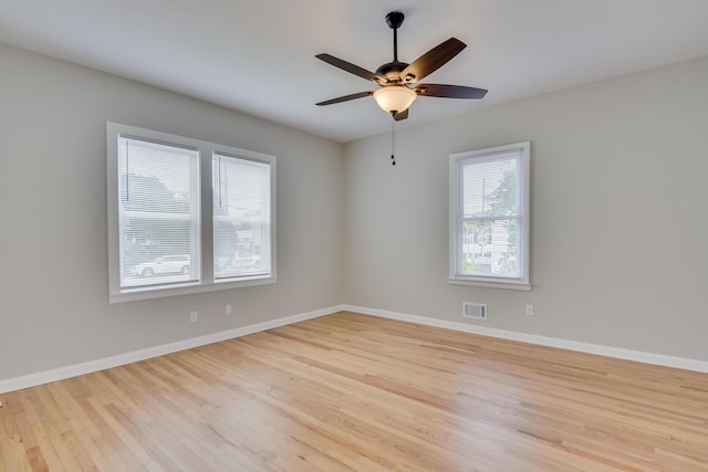 807 Crawford Ave, Augusta, GA 30904 - empty room with wood finished floors, baseboards, and a ceiling fan