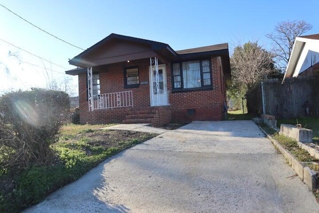 bungalow-style home with a porch