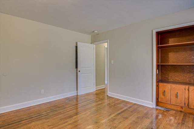 unfurnished bedroom with light hardwood / wood-style floors