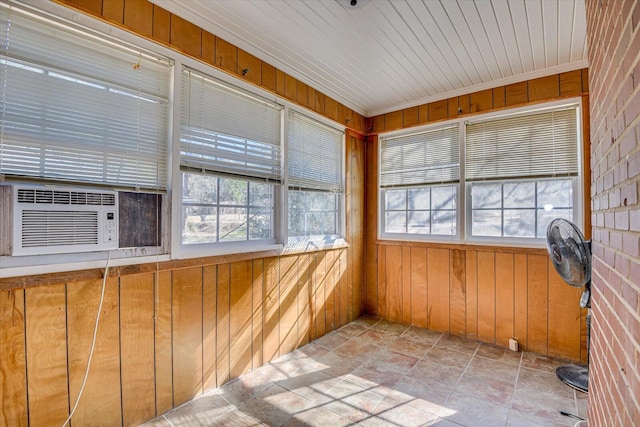 unfurnished sunroom featuring cooling unit