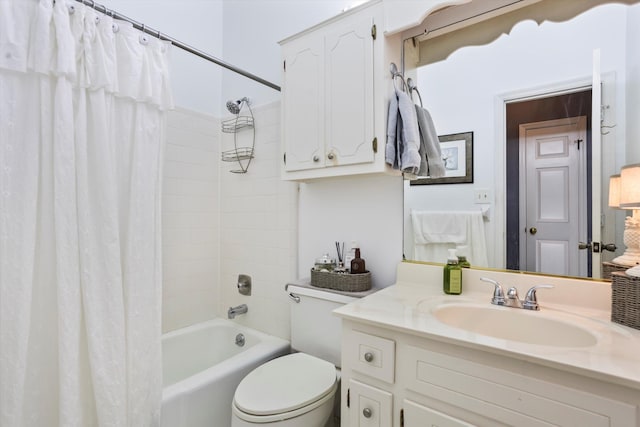 full bath with vanity, toilet, and shower / bath combo with shower curtain