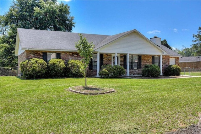 single story home with a front yard