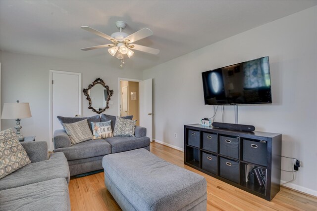 2408 Forest Park Rd, Augusta, GA 30904 - living area featuring light wood-style flooring, a ceiling fan, and baseboards