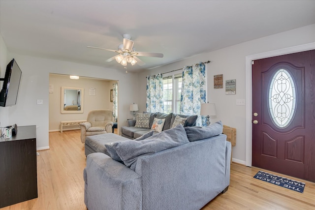 2408 Forest Park Rd, Augusta, GA 30904 - living area with plenty of natural light, light wood finished floors, baseboards, and a ceiling fan